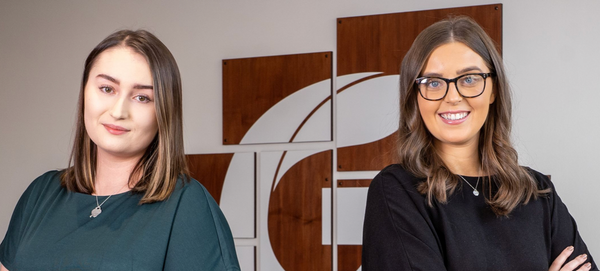 Law firm celebrates double graduation